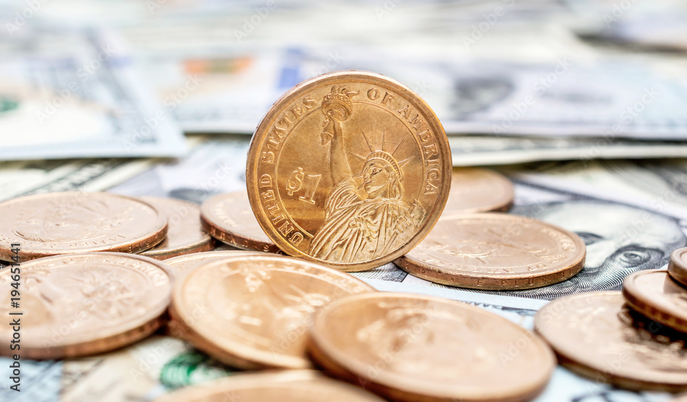US coins on the dollar bills. Business concept. US coins on the dollar bills. Business concept.