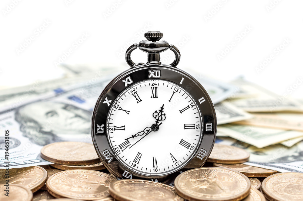 Pocket watch with coins and dollar bills on white background. Pocket watch with coins and dollar bills on white background.