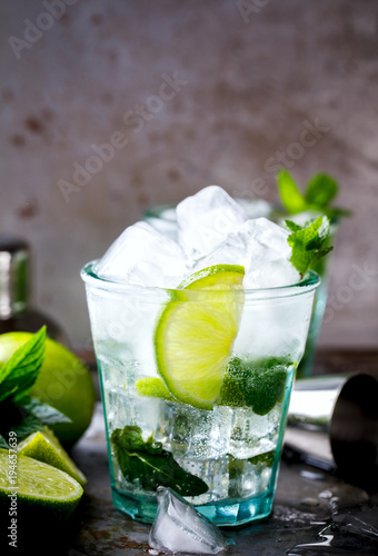 Mojito Cocktail.Mint, lime, ice ingredients for making  and bar utensils.Cold Drink.Top View.Copy space for Text.selective focus.