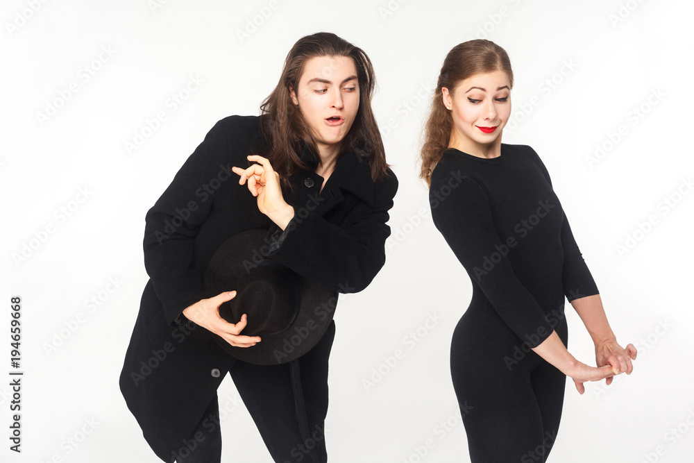 Playful man flirt with confused cute woman. Love concept Playful man flirt with confused cute woman. Love concept