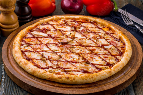 Pizza with meat and barbecue sauce