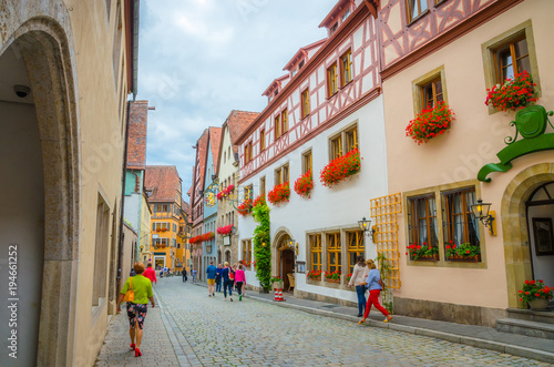 Beautiful streets in Rothenburg ob der Tauber with traditional German houses, Bavaria, Germany © Olena Zn