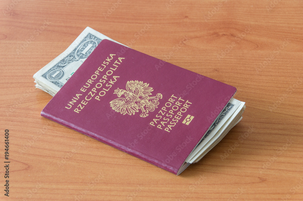 Republic of Poland biometric passport with one dollar banknotes. Republic of Poland biometric passport with one dollar banknotes.