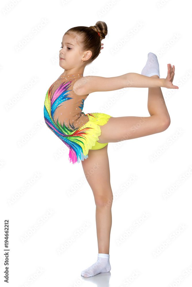The gymnast prepares to perform the exercise. The gymnast prepares to perform the exercise.
