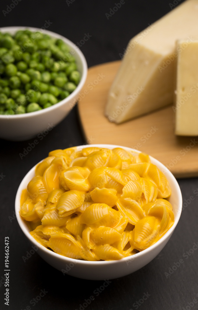 Macaroni Shells and Cheese on a Dark Slate Background