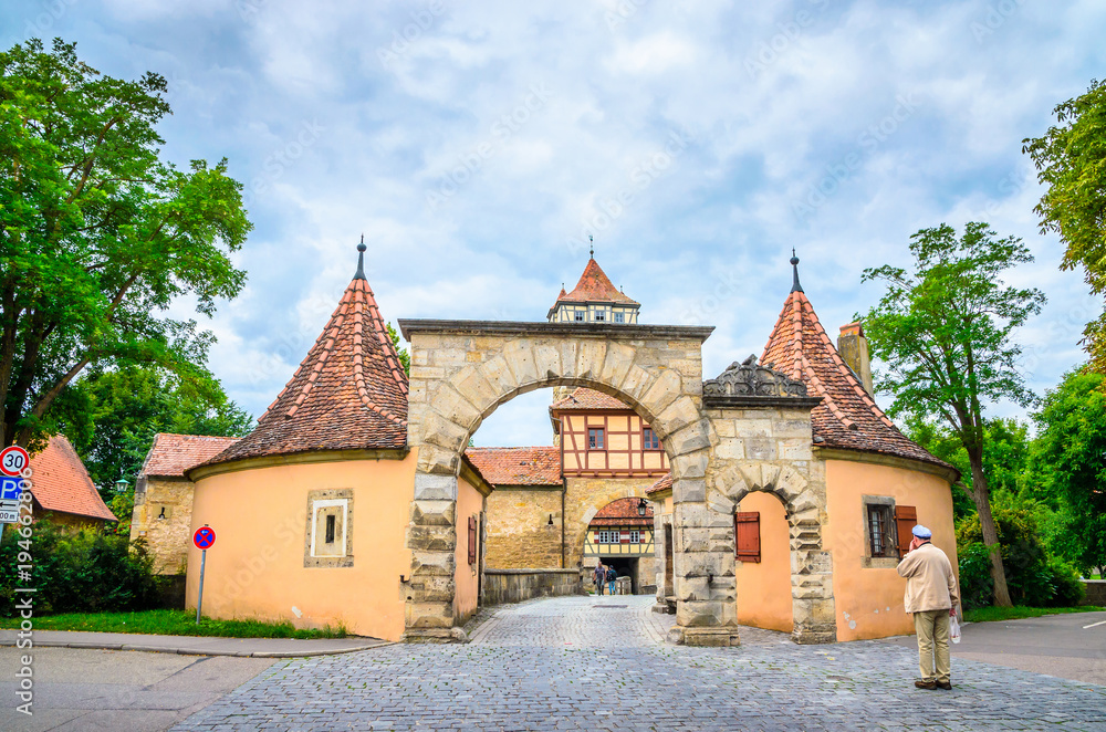 Beautiful streets in Rothenburg ob der Tauber with traditional German houses, Bavaria, Germany Beautiful streets in Rothenburg ob der Tauber with traditional German houses, Bavaria, Germany