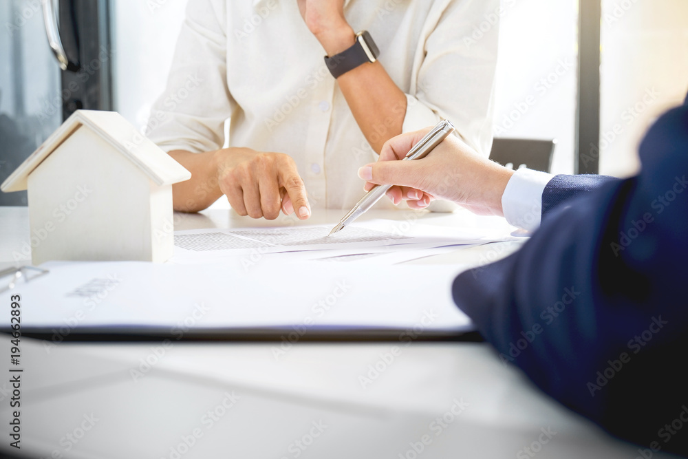 Real estate broker residential agent being analysis and making the decision a home estate loan to customer and waiting for reply to finish house and car rent listing contract Real estate broker residential agent being analysis and making the decision a home estate loan to customer and waiting for reply to finish house and car rent listing contract