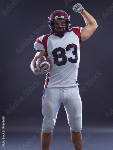 american football player celebrating touchdown