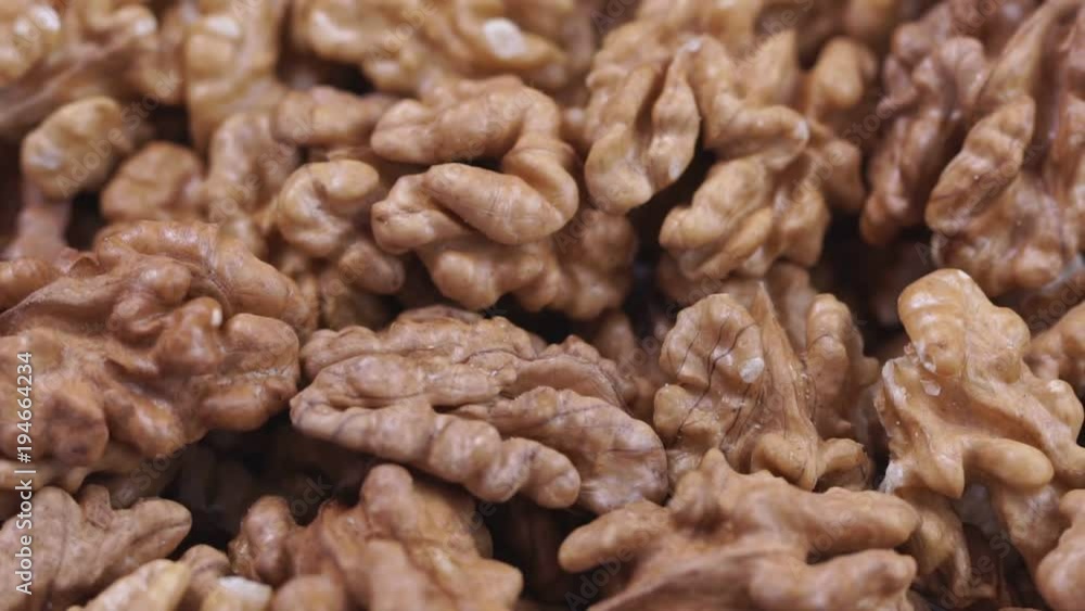Walnut closeup. Rotating nuts background Walnut closeup. Rotating nuts background