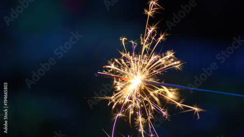 beautiful macro closeup of a sparkler at night