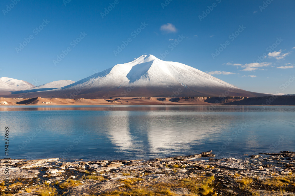 Fototapeta premium Mountain landscape with the Laguna Verde in the Atacama Desert, Chile, Travel & Active Lifestyle concept adventure vacations outdoor