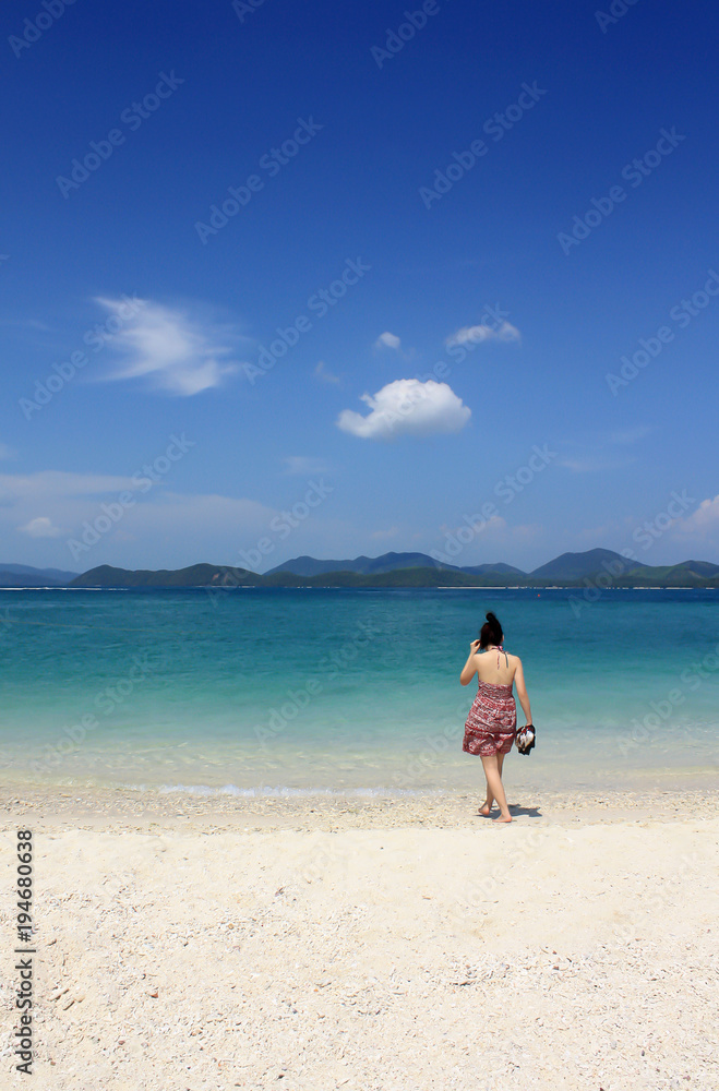 Relaxed woman on the beautiful beach