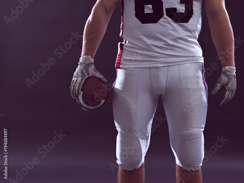 closeup American Football Player isolated on gray