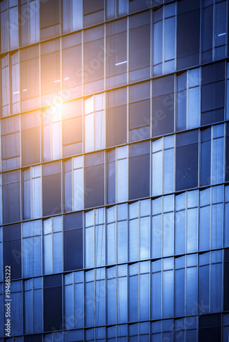 Glass walls of urban skyscrapers