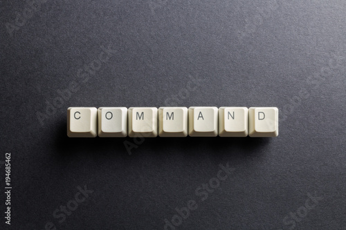 Canvas Print Word command made using computer keyboard buttons on a black background