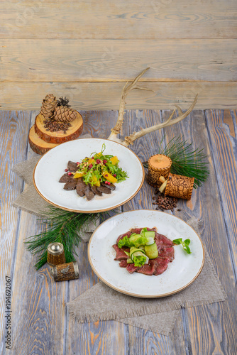 salads in a composition on a wooden background