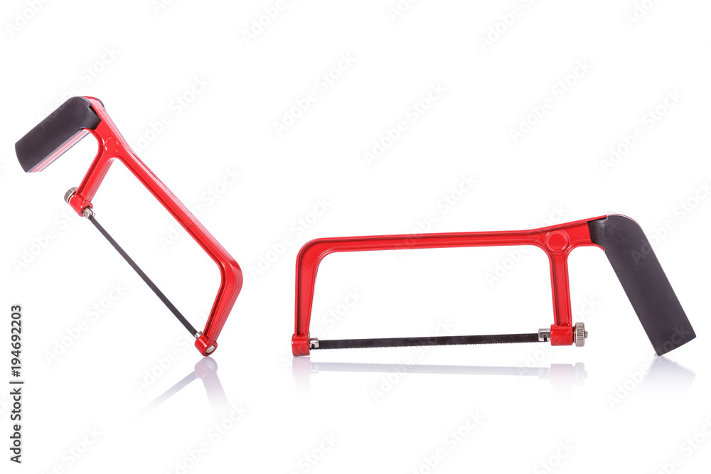 New small saw. Studio shot isolated on white New small saw. Studio shot isolated on white