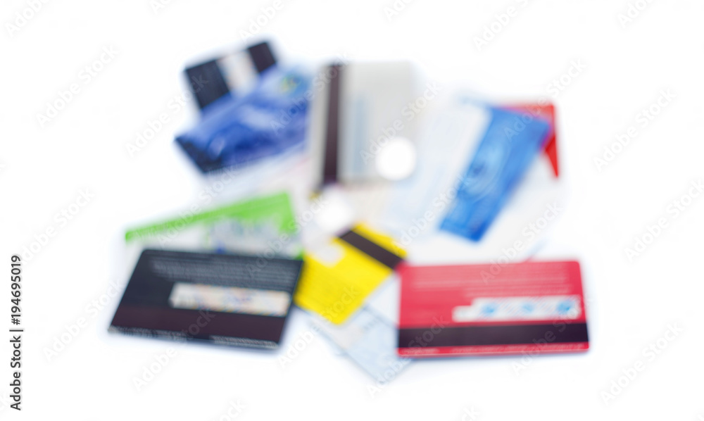 blurred photo of credit cards isolated on white