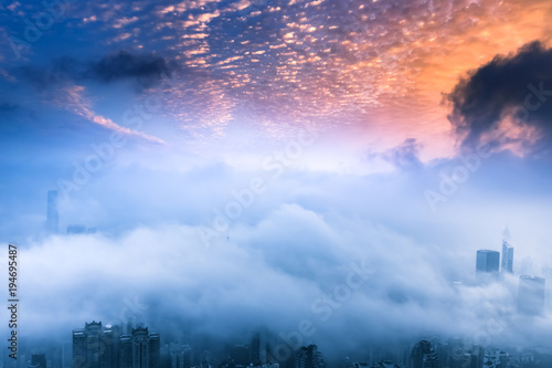 Canvas Print Foggy and Cloudy view of Victoria harbor at Hong Kong