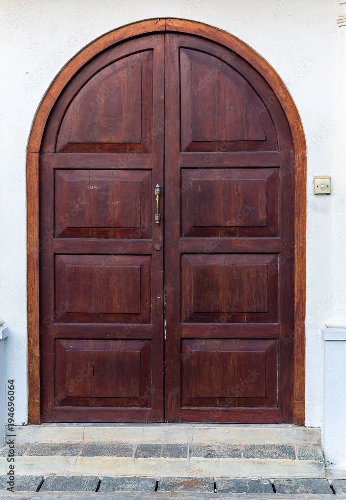 Old wooden brown house door