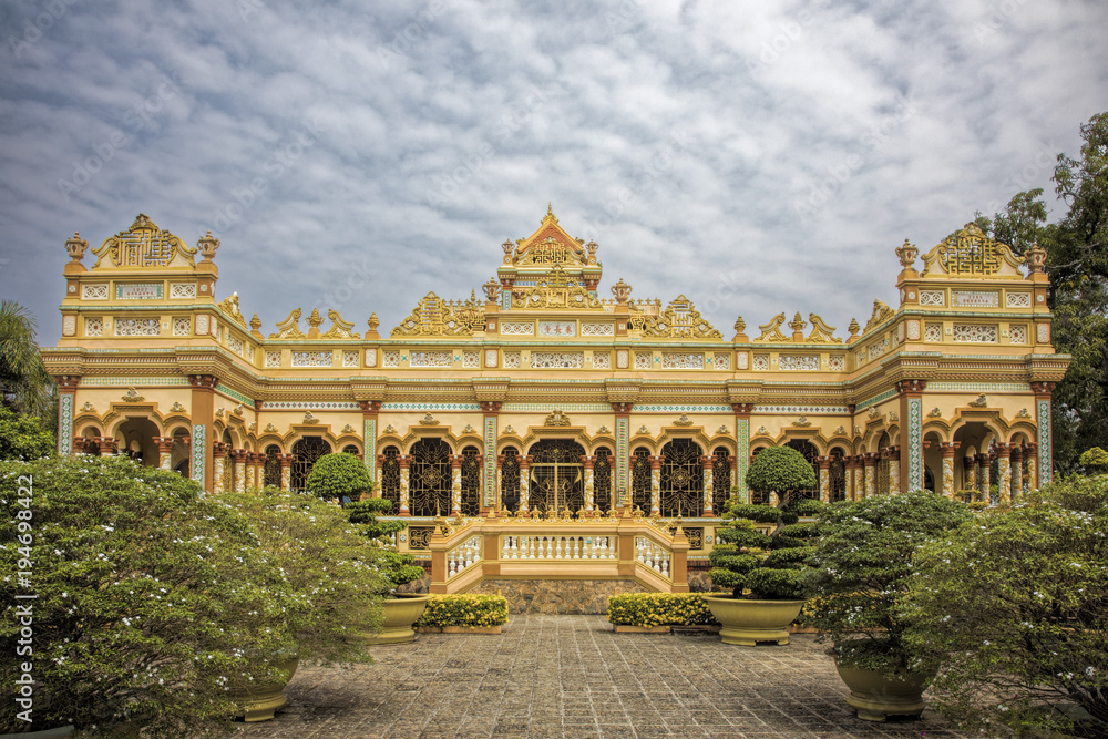 Buddhist temple at the Vinh Trang Temple in Mytho City, Vietnam