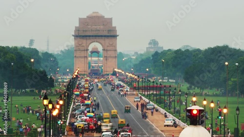 Delhi, India. Time-lapse of Car and people traffic to the India Gate in Delhi in the evening. Zoom in photo