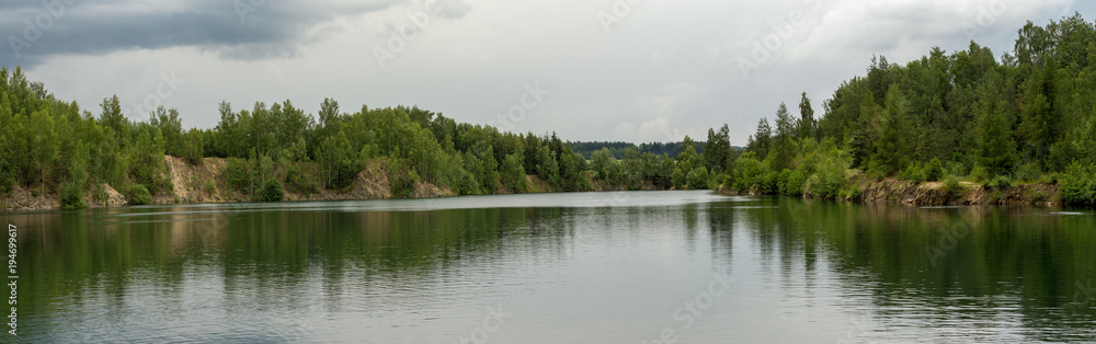 abandoned flooded quarry, Czech republic abandoned flooded quarry, Czech republic