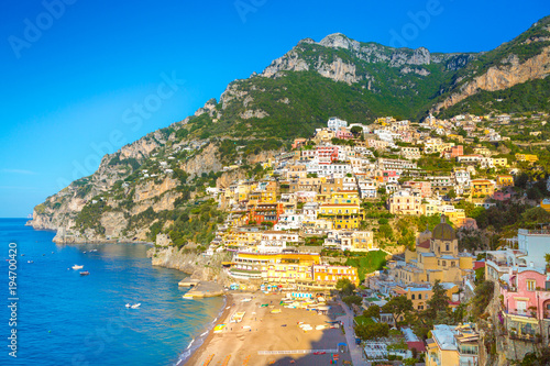 Morning view of Positano cityscape on coast line of mediterranean sea, Italy