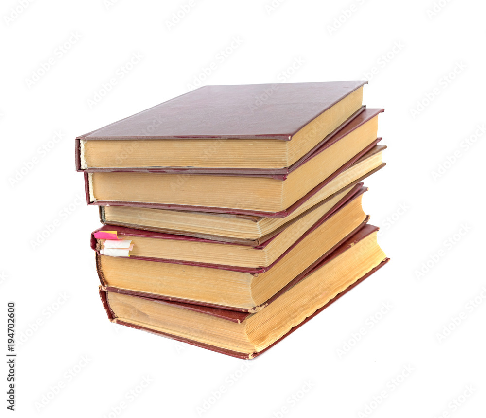 a stack of old books isolated on a white background a stack of old books isolated on a white background