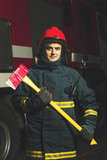 Firefighter with a tool