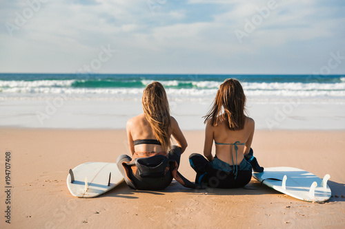 Surfer girls at the beach