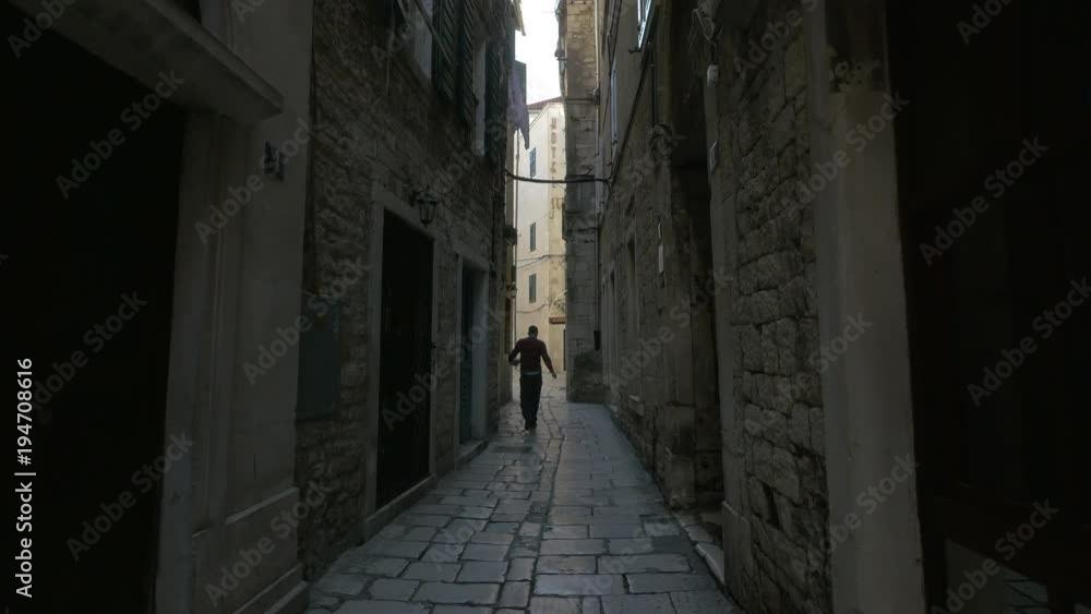 Narrow street with stone buidlings Narrow street with stone buidlings