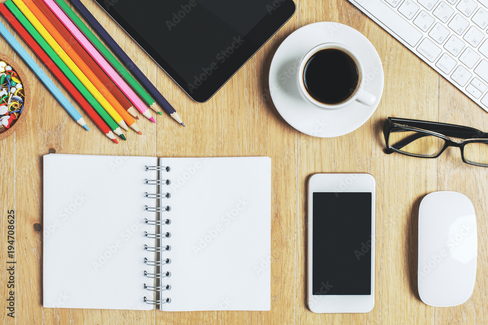Contemporary desktop with device and supplies Contemporary desktop with device and supplies