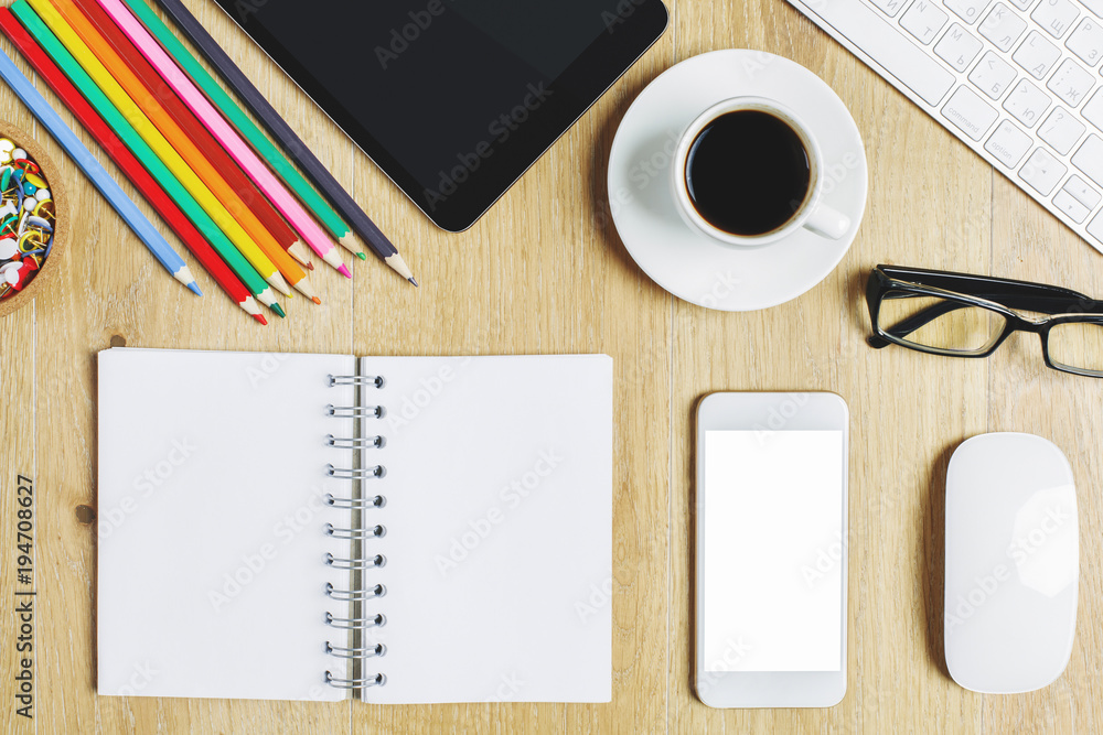 Contemporary desk top with device and supplies Contemporary desk top with device and supplies