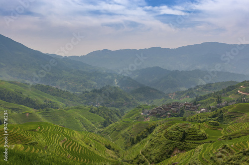 View of the Longsheng Rice Terraces near the of the Dazhai village in the province of Guangxi, in China; Concept for travel in China and beutiful and serene landscape