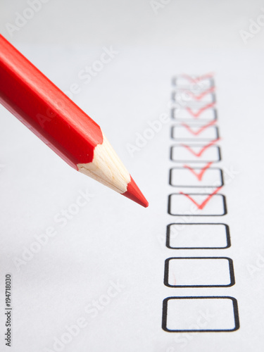 Checklist with red pencil to do plan