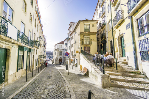 Charming street of historic Alfama, Lisbon, Portugal