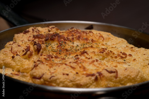 Close up Homemade Spicy Omelet Souffle. (selective Focus)