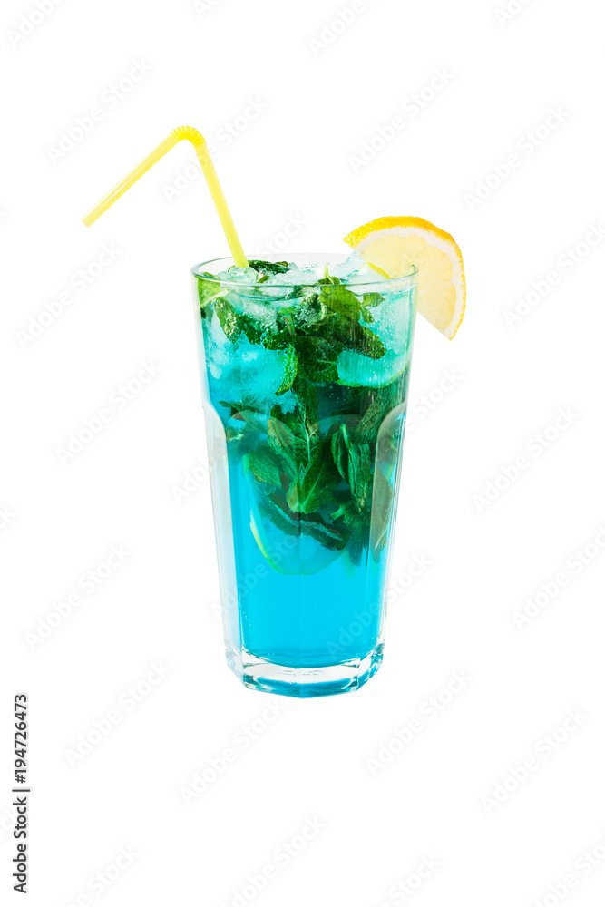 Blue Lagoon cocktail with a slice of lemon and mint isolated on white Blue Lagoon cocktail with a slice of lemon and mint isolated on white