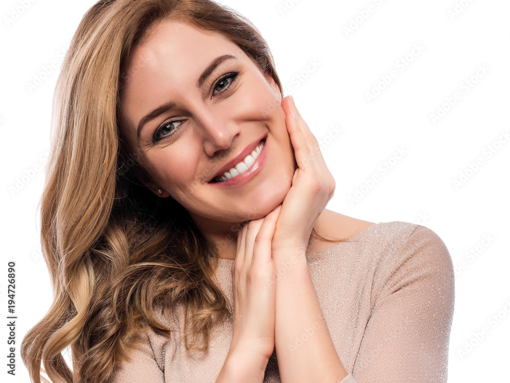 Attractive cute blonde. Close-up portrait on a white. Beautiful young woman in a flesh-colored dress. Attractive cute blonde. Close-up portrait on a white. Beautiful young woman in a flesh-colored dress.
