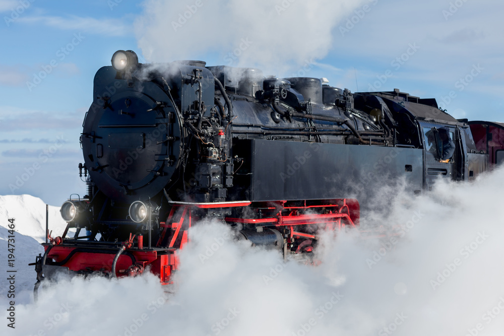 Fototapeta premium historic steam train in the winter