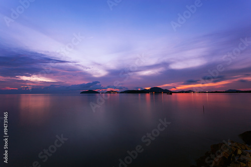 Long exposure image of dramatic sunset or sunrise,sky clouds over tropical sea.
