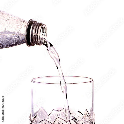 pour water into the glass