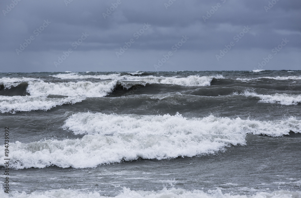 storm clouds and rough waves on the water storm clouds and rough waves on the water