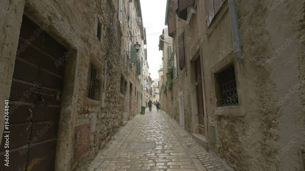 Narrow street with old buildings Narrow street with old buildings