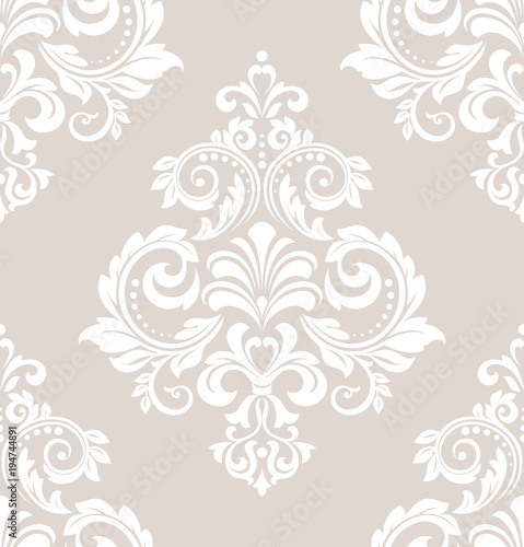 Wallpaper in the style of Baroque. A seamless vector background. White and pink floral ornament. Graphic vector pattern