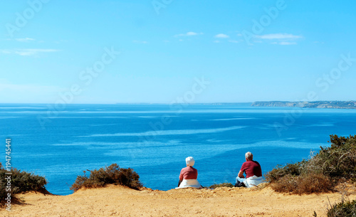 Seniors enjoying the sun at the sea, Lagos, Algarve, Portugal
