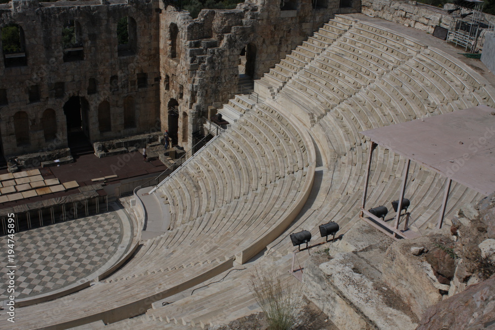 Details of Ancient Odeon of Herodes Atticus in Athens, Greece on Acropolis hill with view over the city.