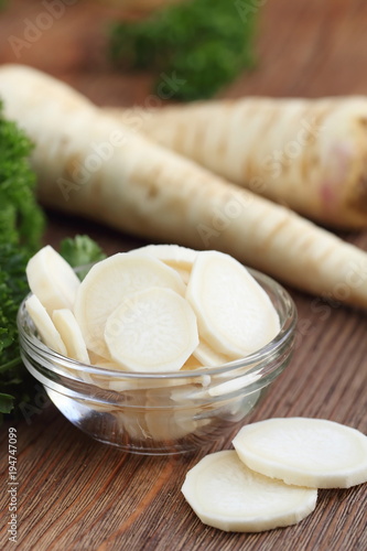 Raw parsley roots for cooking salad