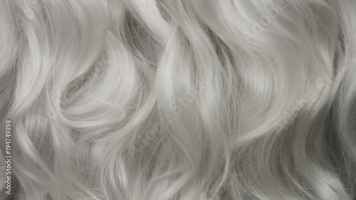 Curly large white grey eldery hair moving slowly 24 fps from 60fps